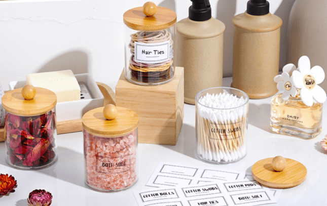 Screenshot 2023-11-09 at 16-21-24 Amazon.com 4 Pack Qtip Holder Dispenser with Bamboo Lids - 10 oz Clear